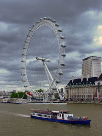 A boat passes the London Eye
