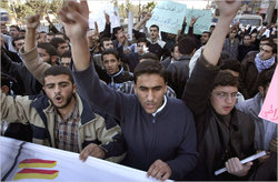 Protestors greet Bush's arrival in Amman
