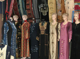 Blonde window mannequins in traditional garb